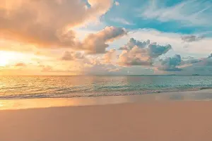 Closeup sea sand beach. Panoramic beach landscape. Inspire tropical beach seascape horizon. Orange and golden sunset sky calmness tranquil relaxing
