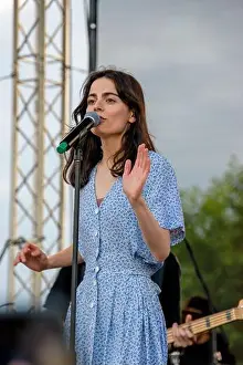 Aeronautical Prints: a closeup of Valeria Stoica singing at her live concert with a guitar at Hangariada - festival in Lasi