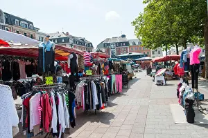 Seine Prints: Clothes stalls at the market in Rouen, France Europe