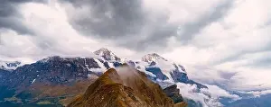 Clouds over Eiger, Monch and Jungfrau mountains view from Mannlichen