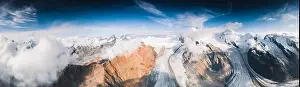 Clouds over mountains peaks and Gorner Glacier (Gornergletscher), aerial view, Zermatt, canton of Valais, Switzerland