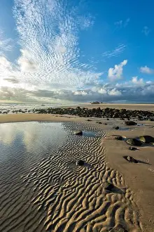 Clouds patterns mirroring the sand ripples on the beach, Elliott Heads, Queensland, QLD, Australia