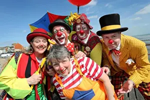 Joking Prints: Clowns performing in the Bognor Regis Clowns Festival 2017 pictured on Bognor Regis Pier in the sun to promote