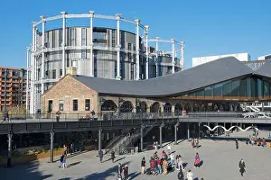Coal Drops Yard modern development with converted luxury apartments from Victorian gas holders behind Kings Cross London England