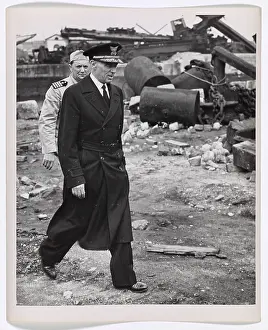 Guard Prints: Coast Guard Commandant Visits Cherbourg's Blasted Waterfront