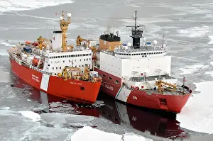 Heavy Prints: US Coast Guard Cutter Healy breaks ice alongside the Canadian Coast Guard heavy icebreaker CCGS Louis S