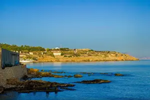 Rocky Shore Prints: Coastal view of Rethymnon in Crete