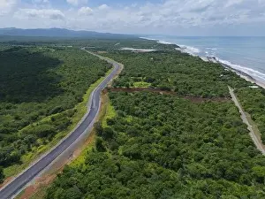 Coastal Road Prints: Coastline landscape road next ocean beach aerial drone view