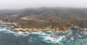 The cold, nutrient-rich waters of the North Pacific Ocean wash against the rocky and scenic coastline of Northern California not far from Monterey