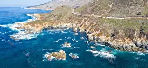 The cold, nutrient-rich waters of the North Pacific Ocean wash against the rocky and scenic coastline of Northern California not far from Monterey