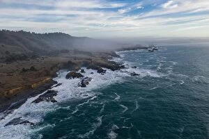 Aerial Landscape Collection: The cold, nutrient-rich waters of the Pacific Ocean beat against the rocky