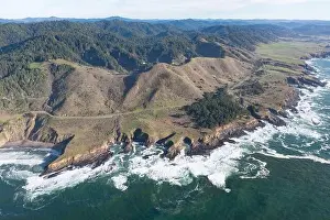 The cold Pacific Ocean washes onto the rugged coastline of Northern California north of Fort Bragg. The Pacific Coast Highway runs along this stretch