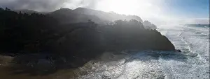 The cold Pacific Ocean washes against the rugged coastline of northern Oregon. This Pacific Northwest is known for its spectacular outdoor scenery