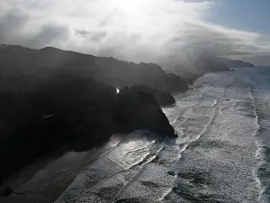 The cold Pacific Ocean washes against the rugged coastline of northern Oregon. This Pacific Northwest is known for its spectacular outdoor scenery