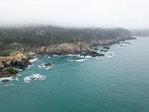 The cold waters of the Pacific Ocean wash against the rocky Northern California coastline in Sonoma, just north of San Francisco