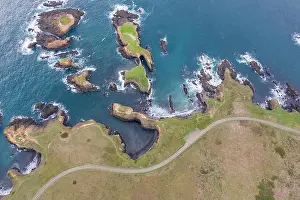 The cold waters of the Pacific Ocean wash against the scenic and rugged Northern California coastline in Mendocino