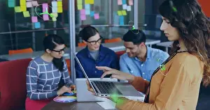 Coworkers Prints: Collaborating woman in orange blouse leading color wheel discussion in meeting room