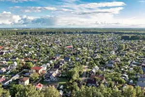 Baloon Prints: Collective gardens, a settlement in the middle of the forest photographed from a hot air balloon