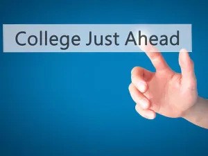 Learn Prints: College Just Ahead - Hand pressing a button on blurred background concept