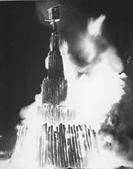 Conflagration Prints: College Station Texas USA, 1977: Smoke and flames arise from the Aggie Bonfire