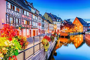 Characteristic Prints: Colmar, Alsace, France. Little Venice, water canal and traditional half timbered houses