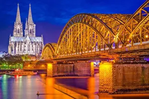 Cologne, Germany old town skyline at Cologne Cathedral and Hohenzollern Bridge