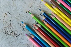 Cork Prints: Much color pencils on the light natural cork background. Design concept. Place for text