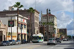 Los Angeles County Prints: Colorado Boulevard looking east in the City of Pasadena shown against a sky with storm clouds