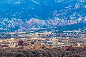 Colorado Springs, Colorado, USA downtown skyline and mountains at dusk
