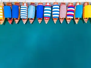 Bled Prints: Colorful Boats on Lake Bled in Slovenia. Travel Wallpaper or Background