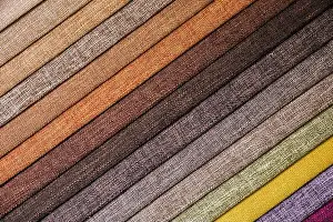 Colorful and bright fabric samples of furniture and clothing upholstery