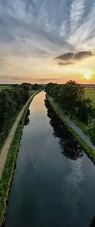 Colorful and dramatic sunset over the canal Dessel Schoten aerial photo shot by a drone in Rijkevorsel
