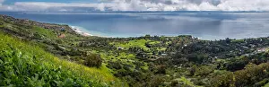 Southern California Prints: Colorful elevated view of Southern California coastline with green rolling hills and flowers in bloom