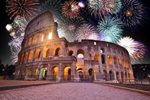 Images Dated 19th October 2019: Colorful Fireworks above the Colosseum in Rome, Italy. Celebrating New Years Eve