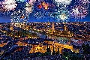 Images Dated 21st July 2018: Colorful Fireworks above Verona Cityscape, in Italy, Celebrating New Years Eve