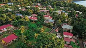 Holiday House Prints: Colorful Houses among the green trees on the Guadalupe hills, Caribbean islands