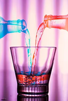 Pouring Prints: Colorful liquids pouring on glass