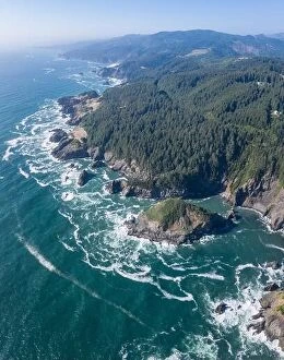 Aerial Landscape Collection: The colorful Pacific Ocean washes against the scenic, rugged coastline of southern Oregon