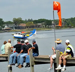 Watching Prints: A colorful Republic Seabee amphibian aircraft splashing down in Lakes Agnes, Fl