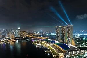 Images Dated 24th February 2017: Colorful Singapore skyscraper building and laser show in night at Singapore