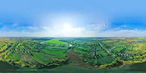Colorful spherical Aerial 360-degree panorama over the countryside