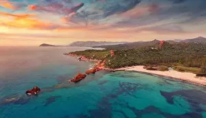 Colorful summer view from flying drone of di Cea beach with Red Rocks Gli Scogli Rossi - Faraglioni