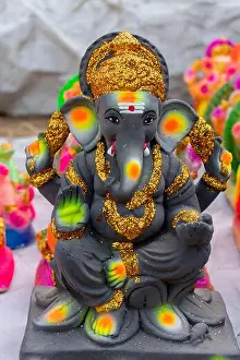 Ganapati Prints: colorful vinayagar idol design in a shop
