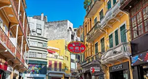 Blue Skies Prints: Colourful buildings with balconies in the historic center. Macau, China