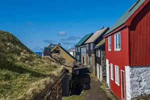 Travel Brochure Prints: Colourful houses, in the remote village of Mykines in Faroe Islands