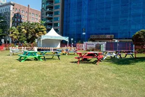 Outdoor Furniture Prints: Colourful outdoor picnic table in English bay Vancouver, BC Canada