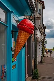 Colourful red ice cream cone display outside a traditional Ice Cream Shop in Southwold