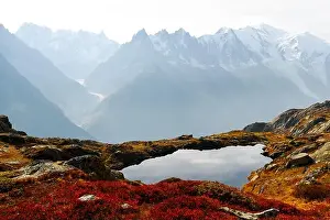 Colourful sunset on Chesery lake (Lac De Cheserys) in France Alps. Monte Bianco mountain range on background. Chamonix, Graian Alps