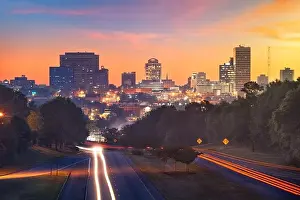 Columbia, South Carolina, USA downtown city skyline from above roadways at dawn