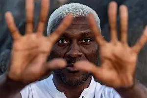 Intense Prints: A compelling close-up portrait of an African American man with striking white hair